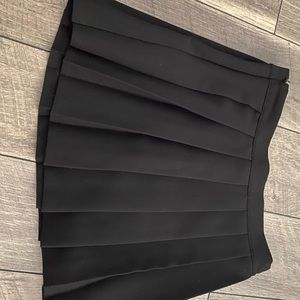 Black pleated skirt